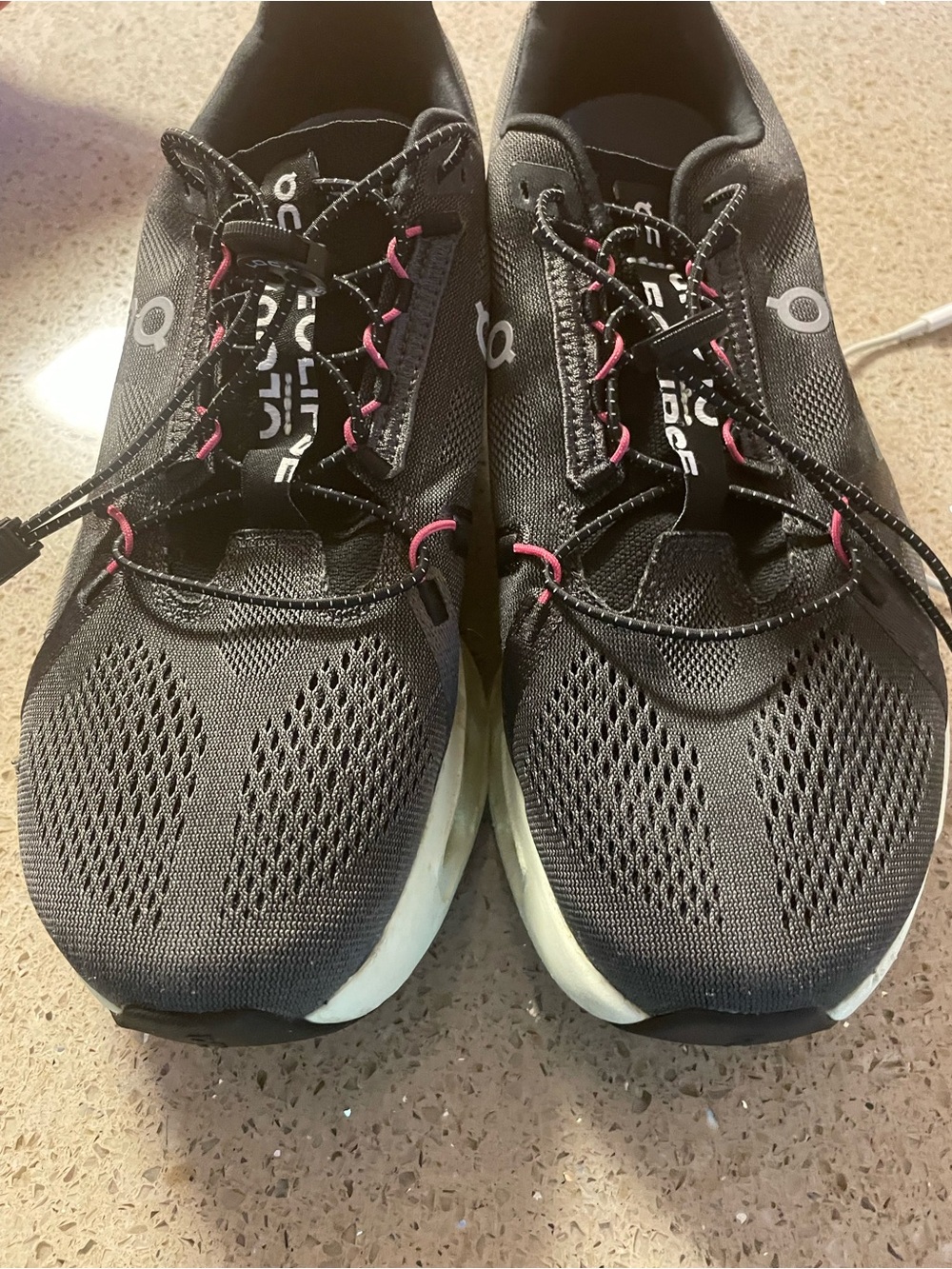 On Running Men's Black Sneakers with Pink Accents